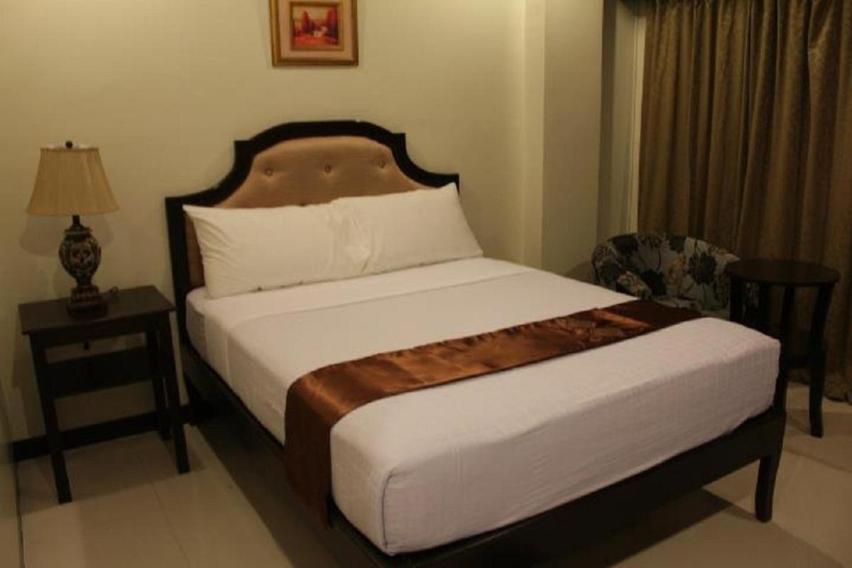 Peridot Suites Davao Phòng bức ảnh